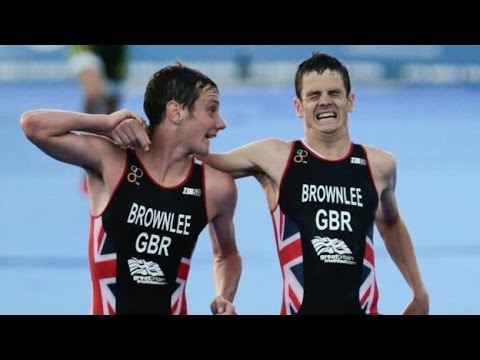 Jonny Brownlee helped over line by brother Alistair